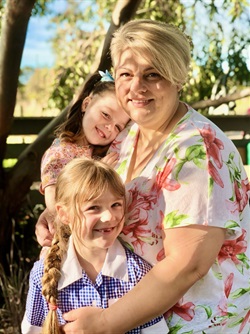 Melissa Oberin with granddaughters Delilah, front, and Willow.jpg