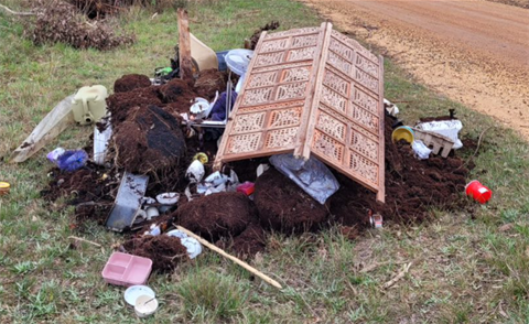 load of rubbish on the side of the road