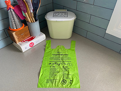caddy-in-corner-of-kitchen-with-liner-laid-out-on-the-bench-in-frontWEB.png