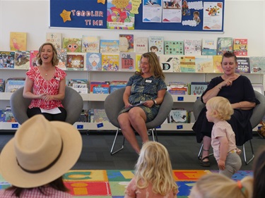 Librarian KatyAnne with Mayor Liz Pattison and Auslan interpreter talking to children at Torquay Library