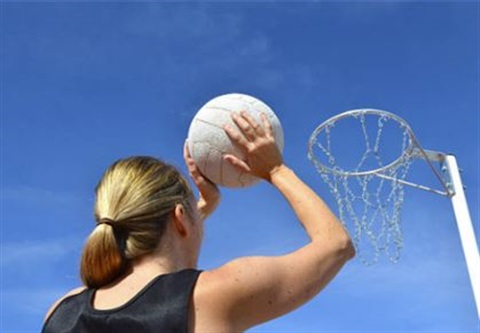 View of a netball player shooting the ball