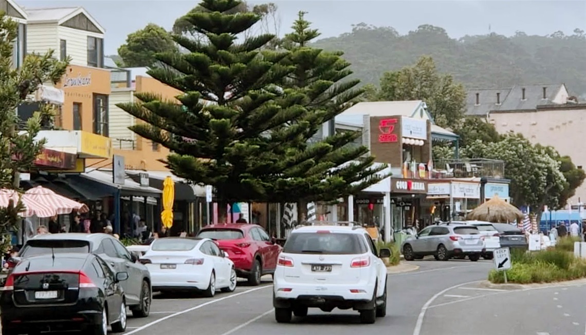 Lorne main street with cars and businesses