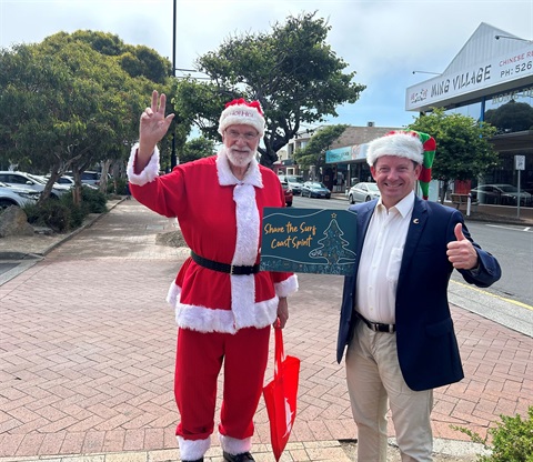 Santa and Councillor Paul Barker encourage people to Share the Surf Coast Spirit.jpg