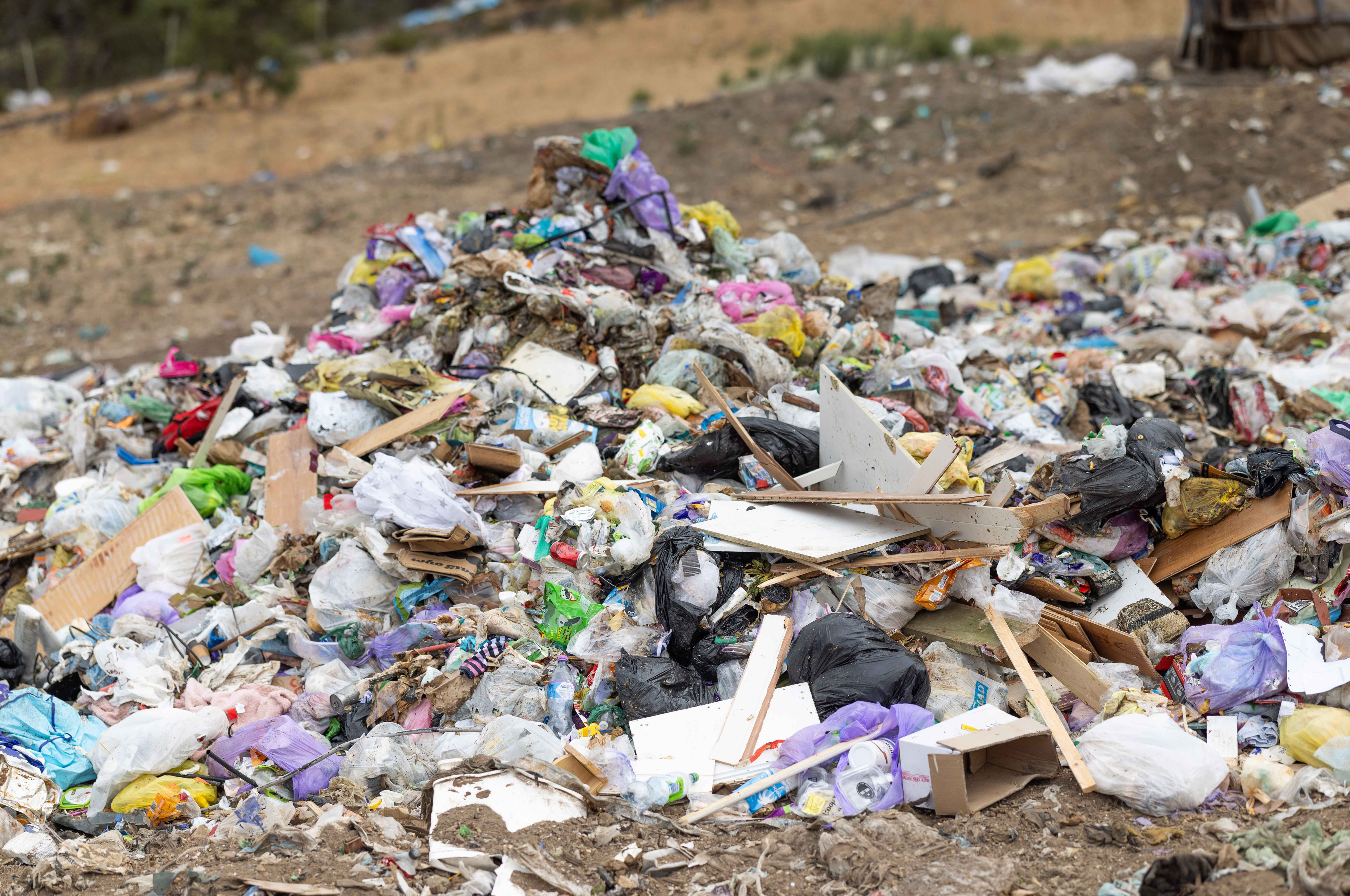 a pile of rubbish at the landfill